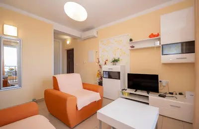 TV i/ili zabavni centar u objektu Apartments Rejo