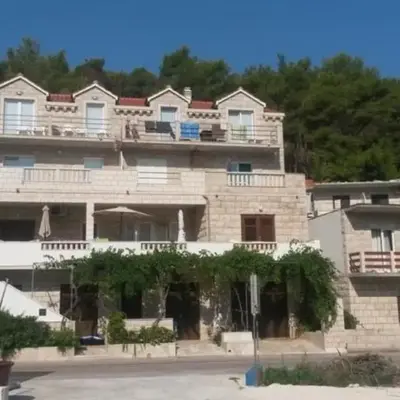 Apartments by the sea Povlja