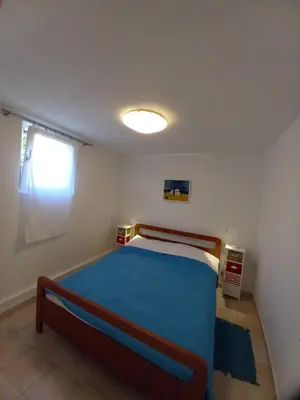 Krevet ili kreveti u jedinici u objektu Marina Crveni Apartman