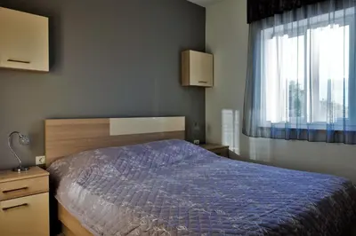 Krevet ili kreveti u jedinici u objektu Villa Barbara Apartments