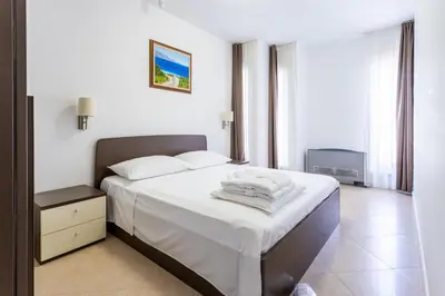 Krevet ili kreveti u jedinici u objektu Family-friendly apartments with swimming pool Splitska, Brac - 23224
