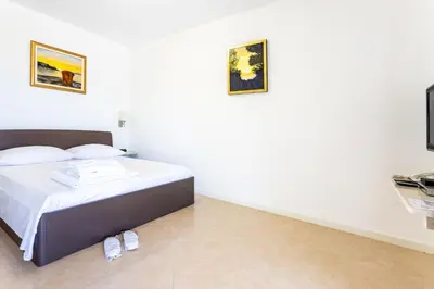 Krevet ili kreveti u jedinici u objektu Family-friendly apartments with swimming pool Splitska, Brac - 23224