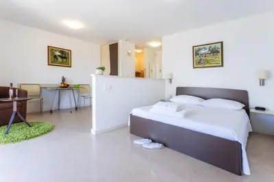 Krevet ili kreveti u jedinici u objektu Family-friendly apartments with swimming pool Splitska, Brac - 23224