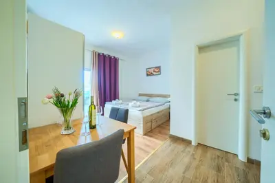 Krevet ili kreveti u jedinici u objektu Cozy New Apartments with Private Pool Podstrana