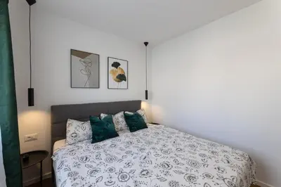 Krevet ili kreveti u jedinici u objektu Holiday Lux