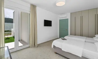 Krevet ili kreveti u jedinici u objektu Stylish villa Tenera with private pool, 3 bedrooms