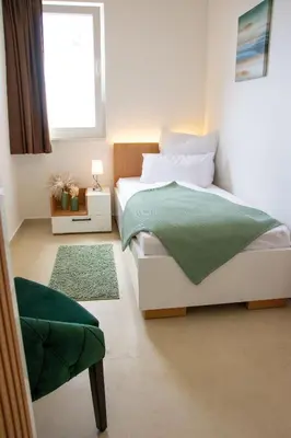 Krevet ili kreveti u jedinici u objektu JOELL Apartments