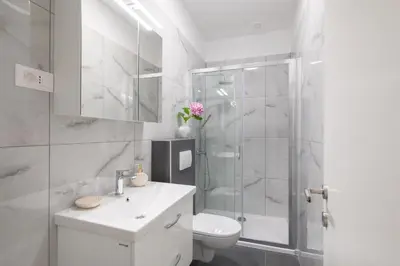 Kupaonica u objektu Bluetique Beach Apartments