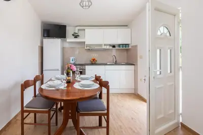 Kuhinja ili čajna kuhinja u objektu La Playa Beach Apartment