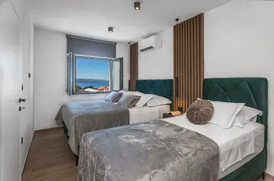 Krevet ili kreveti u jedinici u objektu Apartments Ivan