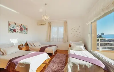 Krevet ili kreveti u jedinici u objektu Cozy Home In Podstrana With Sauna