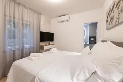Krevet ili kreveti u jedinici u objektu Apartment Avorio, Postira Brač