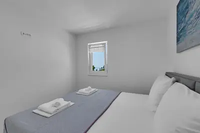 Krevet ili kreveti u jedinici u objektu Luxurious And Bright Apartment With Sea And Mountain View