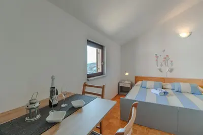 Krevet ili kreveti u jedinici u objektu Loft studio apartment near center