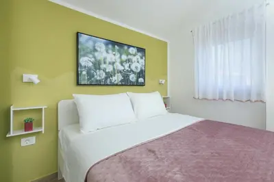 Krevet ili kreveti u jedinici u objektu Pinia Apartment Split