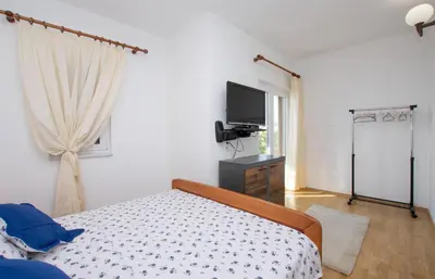 TV i/ili zabavni centar u objektu Apartments Ivante