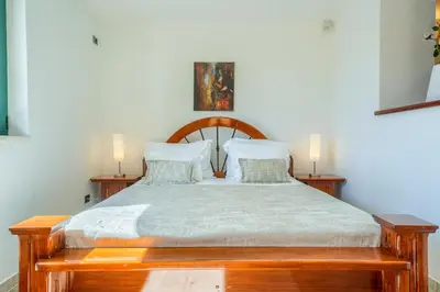 Krevet ili kreveti u jedinici u objektu Villa Rasotica Relaxing Villa with Heated Pool, Perfect for Families