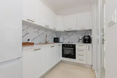Kuhinja ili čajna kuhinja u objektu Adriatic Split beach apartment with sea view and garden
