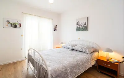 Krevet ili kreveti u jedinici u objektu Amazing Apartment In Sutivan With House Sea View