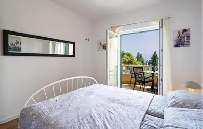Krevet ili kreveti u jedinici u objektu Amazing Apartment In Sutivan With House Sea View