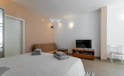 TV i/ili zabavni centar u objektu Studio apartman Bella