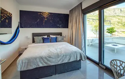 Krevet ili kreveti u jedinici u objektu 3 Bedroom Lovely Home In Dugi Rat