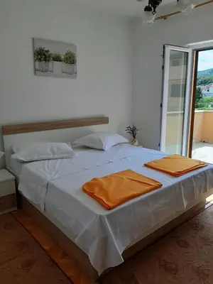 Krevet ili kreveti u jedinici u objektu Apartments Nela