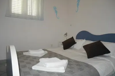 Krevet ili kreveti u jedinici u objektu Apartments Jure with Sea View