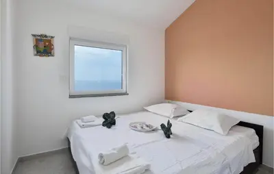 Krevet ili kreveti u jedinici u objektu Lovely Home In Podstrana With Wifi