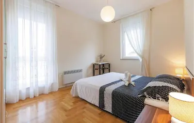 Krevet ili kreveti u jedinici u objektu Apartment Podstrana With Sea View 366