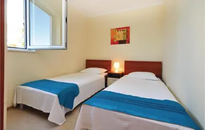 Krevet ili kreveti u jedinici u objektu Apartment Mimice With Sea View 381