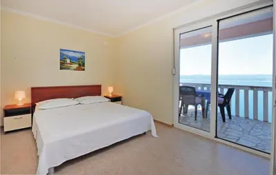 Krevet ili kreveti u jedinici u objektu Apartment Mimice With Sea View 382