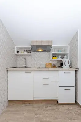 Kuhinja ili čajna kuhinja u objektu Apartments Lada