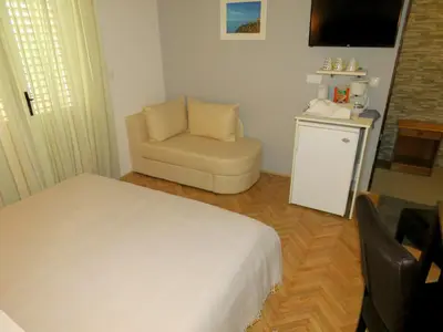 Krevet ili kreveti u jedinici u objektu Apartments Staničić