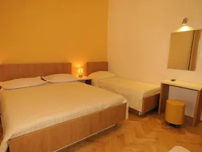 Krevet ili kreveti u jedinici u objektu Apartments Staničić