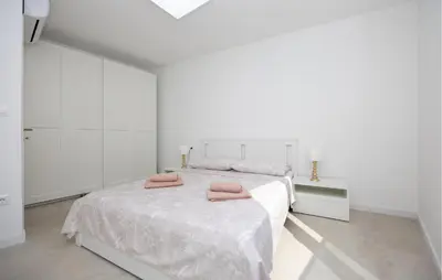 Krevet ili kreveti u jedinici u objektu Stunning Apartment In Split With House Sea View