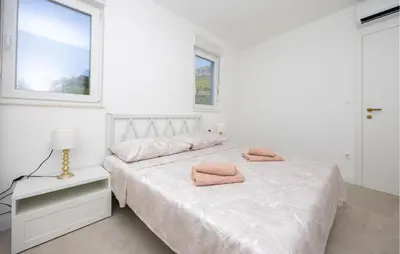 Krevet ili kreveti u jedinici u objektu Stunning Apartment In Split With House Sea View