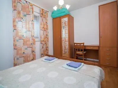 Krevet ili kreveti u jedinici u objektu Apartments Longo - One Bedroom Apartment with Terrace, A2 - ST
