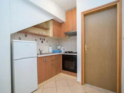 Kuhinja ili čajna kuhinja u objektu Apartments Longo - One Bedroom Apartment with Terrace, A2 - ST