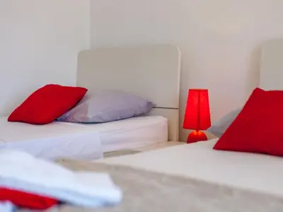 Krevet ili kreveti u jedinici u objektu Apartments Nena ST - Two Bedroom Apartment with Terrace and Sea View A3