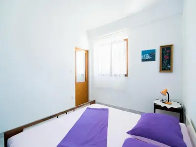 Krevet ili kreveti u jedinici u objektu Apartments Veve - One Bedroom Apartment with Terrace Sea View Nensi ST
