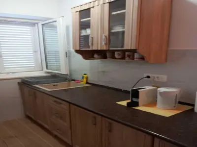 Kuhinja ili čajna kuhinja u objektu Apartments Kalajzic - Two Bedroom Apartment with Garden and Terrace A2 ST