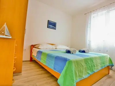 Krevet ili kreveti u jedinici u objektu Apartments Lenka - One Bedroom Apartment with Balcony and garden View A1