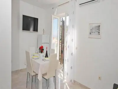 TV i/ili zabavni centar u objektu Apartments Lenka - One Bedroom Apartment with Balcony and Center View A3