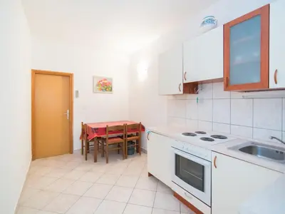 Kuhinja ili čajna kuhinja u objektu Apartments Neva- One Bedroom Apartment