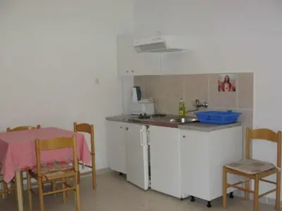 Kuhinja ili čajna kuhinja u objektu Apartments Boguvila - One-Bedroom Apartment with Terrace A3 - ST