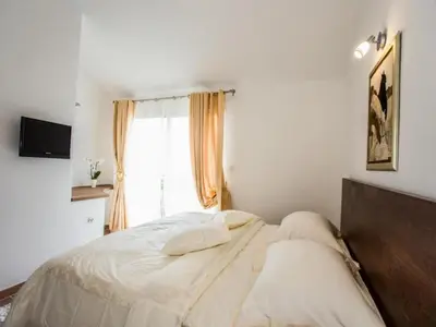 Krevet ili kreveti u jedinici u objektu Villa Suzy Lux- Duplex Two Bedroom Villa with Swimming Pool and Sea View