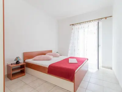 Krevet ili kreveti u jedinici u objektu Apartments Neva- Standard Two Bedroom Apartment with Terrace and Sea View 4Z