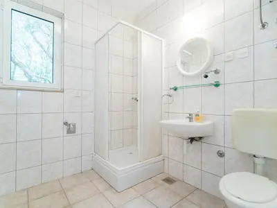 Kupaonica u objektu Apartments Neva- Standard Two Bedroom Apartment with Terrace and Sea View 4Z