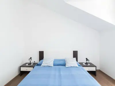 Krevet ili kreveti u jedinici u objektu Apartments Mare- One Bedroom Apartment with Garden View A3 ST